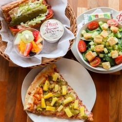 Dion's - A 6" turkey sub with a side of chipotle ranch, a half tossed salad with ranch, and a slice of pizza with pineapple and green chile.