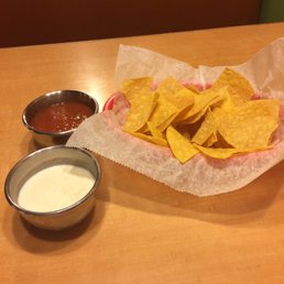 Chips and salsa red and and a special blend of salad dressing and spices. It has a slight lemony flavor to it. Chips and salsa red and and a special blend of salad dressing and spices. It has a slight lemony flavor to it.