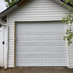 Insured Roofs - Garage door, siding