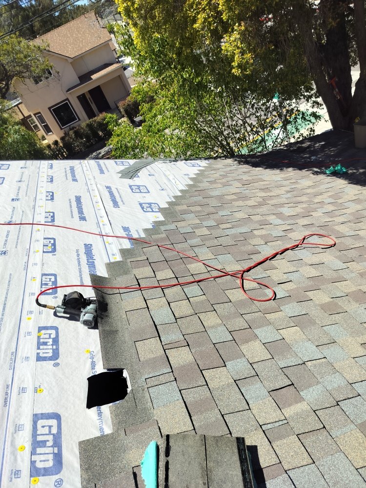 Slide of Pacific Roofing