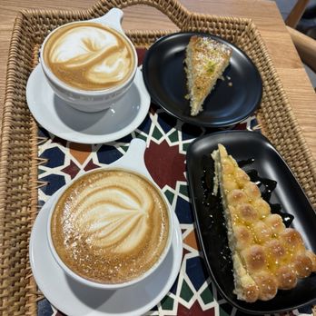 Qamaria Yemeni Coffee - Qamaria lattes, honeycomb cake, and cake with cream cheese - Coffee & Tea Near Me - Vienna, Virginia Qamaria Yemeni Coffee - Qamaria lattes, honeycomb cake, and cake with cream cheese - Coffee & Tea Near Me - Vienna, Virginia