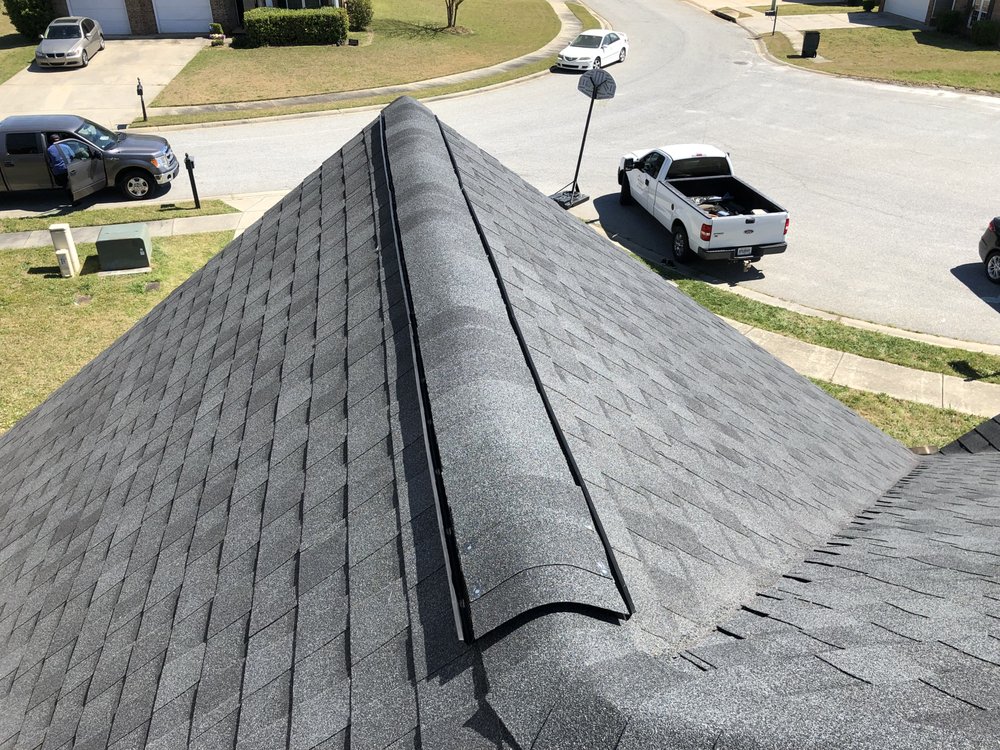 Slide of Woodward Roofing