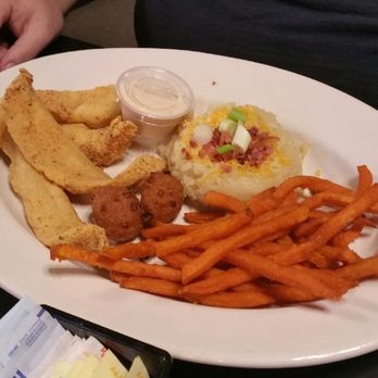 The Pharm Restaurant - Fried fish plate with sweet potato fries and loaded mashed potatoes. - Steakhouses Near Me - Buffalo, Texas