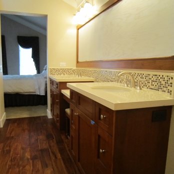 Artisan Builders - a double sink in a bathroom - General Contractors Near Me