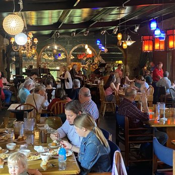 Larry Bruce Gardens - a large group of people eating at a restaurant - Guest Houses Near Me - Kennard, Texas Larry Bruce Gardens - a large group of people eating at a restaurant - Guest Houses Near Me - Kennard, Texas