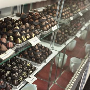 Pandolfi's Fine Chocolates - Chocolates by the pound. The yellow drizzled chocolates are lemon crème and amazing! - Chocolatiers & Shops Near Me - Bellingham, Massachusetts
