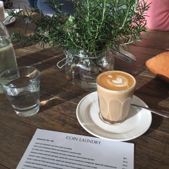 Coin Laundry Cafe - Cafe latte on the communal table - Restaurants Near Me - Armadale, VIC Coin Laundry Cafe - Cafe latte on the communal table - Restaurants Near Me - Armadale, VIC