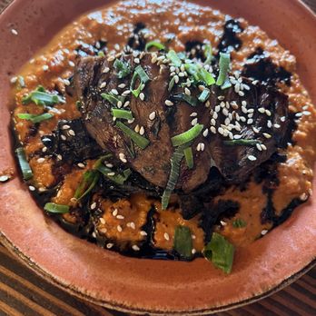 Three's Bar & Grill - Portobello mushroom with tomato coulis and mac-nut goat cheese - Asian Fusion Near Me - Kihei, Hawaii Three's Bar & Grill - Portobello mushroom with tomato coulis and mac-nut goat cheese - Asian Fusion Near Me - Kihei, Hawaii