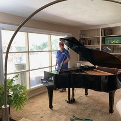 Fresno Piano - Baby grand makes it's home in my living room... Guys setting it up...