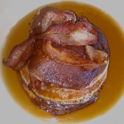 Frankie & Benny's - Pancake and bacon stack with maple syrup.