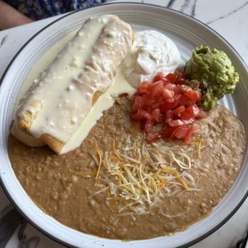 Casa Mexico Restaurant - Chimichanga with refried beans - Mexican Near Me - Orlando, Florida Casa Mexico Restaurant - Chimichanga with refried beans - Mexican Near Me - Orlando, Florida