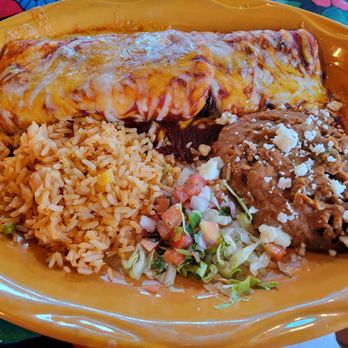 Hula Hut - Tubular beef fajita enchilada. Great presentation but definitely not enough fajita meat on the inside. - Tex-Mex Near Me - Austin, Texas Hula Hut - Tubular beef fajita enchilada. Great presentation but definitely not enough fajita meat on the inside. - Tex-Mex Near Me - Austin, Texas