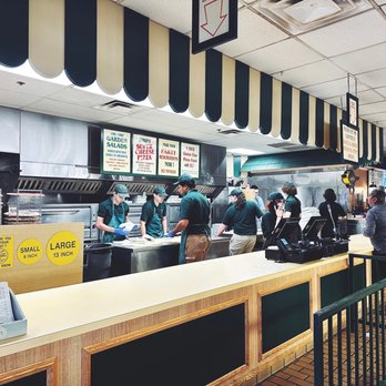 Marion's Piazza - a line of people in a restaurant - Pizza Near Me - Dayton, Ohio