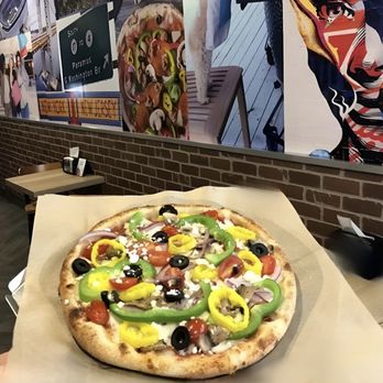 Ethan's Pizza - a pizza with various toppings - Pizza Near Me - Paramus, New Jersey