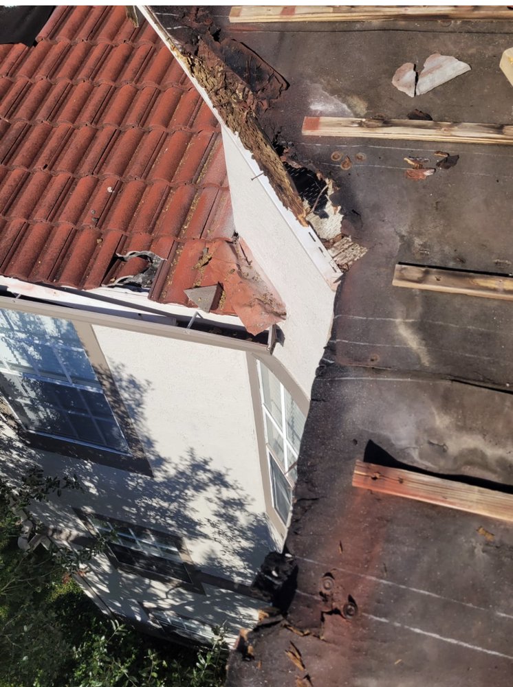 Slide of John Feeney Roofing