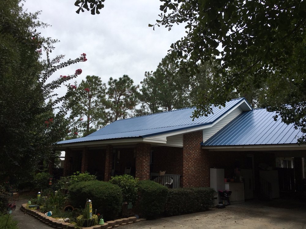 Slide of Patch Adams Roofing