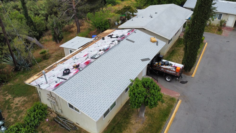 Slide of Ruiz Roofing