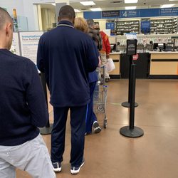 Walmart Pharmacy - Love me some Walmart customer service. If you look closely at the white board, it says, "minimum wait time 1 hour."