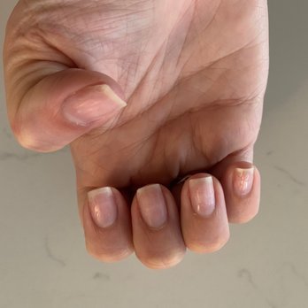 Bliss Nail Spa Winter Park - My other hand with divots, poor buff and uneven file. - Nail Salons Near Me - Winter Park, Florida
