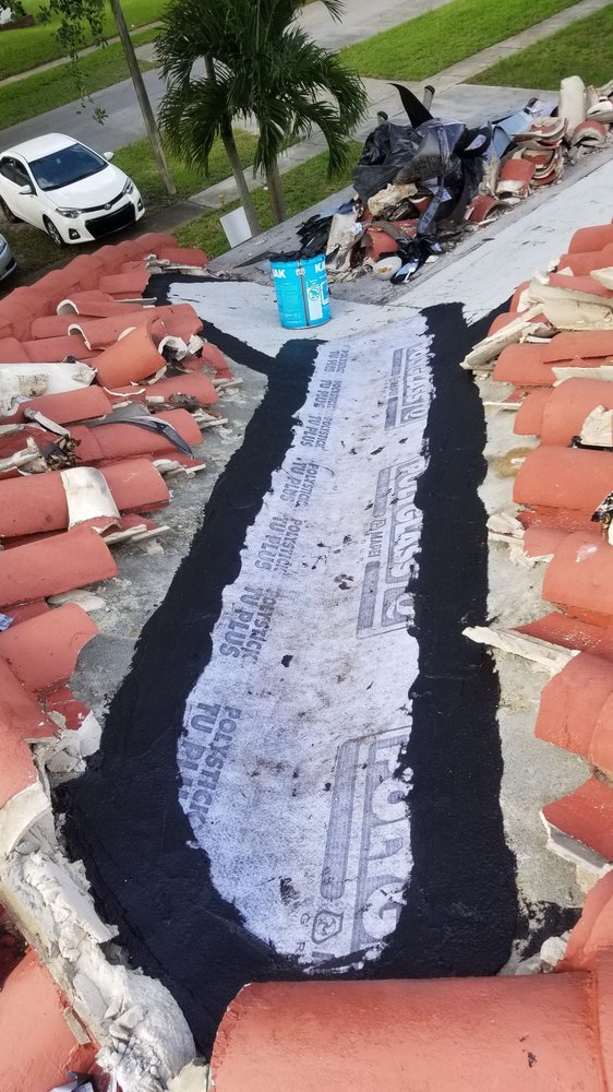 Slide of Dynasty Roofing