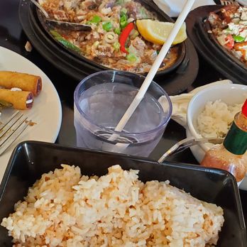 Max's Restaurant - Milpitas - pork sisig in the background next to their bangus sisig - Filipino Near Me - Milpitas, California Max's Restaurant - Milpitas - pork sisig in the background next to their bangus sisig - Filipino Near Me - Milpitas, California