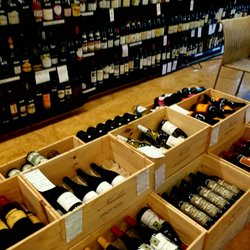 The Twisted Vine - Shelves and cases of wine.
