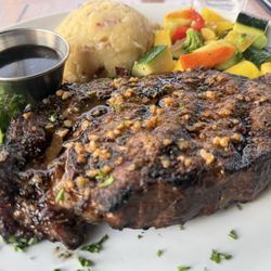 Prime ribeye with seasonal medley. Phenomenal cut.