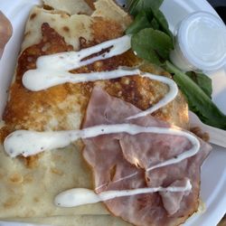 Country Crepes - Ham cheese $14.. the cup of sour cream in the picture is not part of the dish