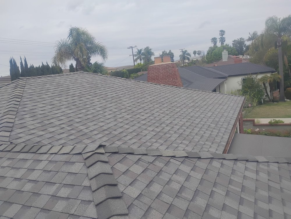 Slide of Sam's Roofing Co