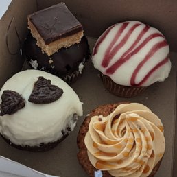 a variety of cupcakes in a box a variety of cupcakes in a box