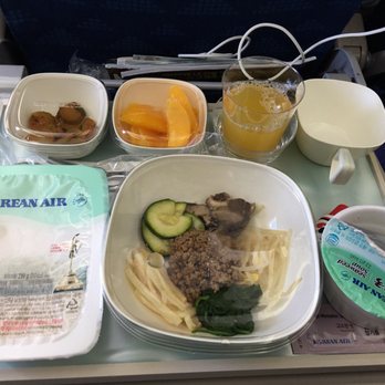 Korean Air - Bibimbap - airplane style.  Not bad!  Enjoyed the toothpaste tubes of gochujang! - Airlines Near Me - San Francisco, California