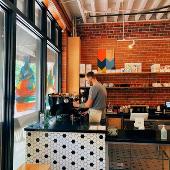Slow By Slow Coffee Bar - a man preparing a cup of coffee - Coffee & Tea Near Me - Boise, Idaho Slow By Slow Coffee Bar - a man preparing a cup of coffee - Coffee & Tea Near Me - Boise, Idaho