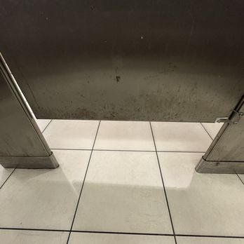 Cordova Mall - Caked on grime inside stall - Shopping Centers Near Me - Pensacola, Florida