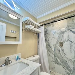 Salty Living Island Rentals, LLC - Villa B rain shower