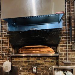 Ember & Greens - Big Open Fire Dutch Oven behind the bar