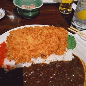 Waraku - Premium beef curry with pork katsu, hard to see, but the green bowl is takowasa - Izakaya Near Me - Torrance, California Waraku - Premium beef curry with pork katsu, hard to see, but the green bowl is takowasa - Izakaya Near Me - Torrance, California