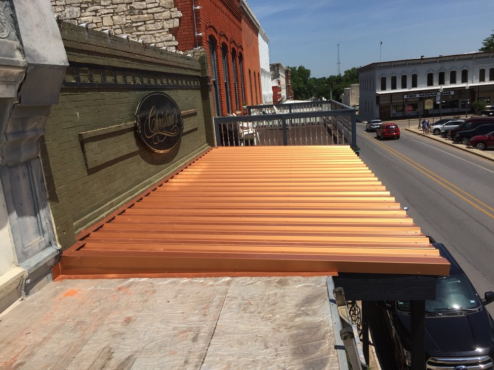 Slide of Andis Roofing & Remodeling