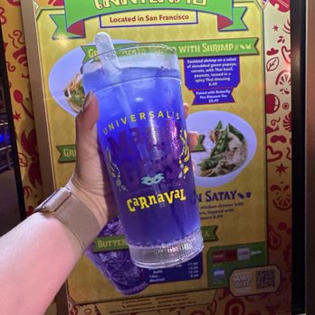 Universal Studios Mardi Gras - Butterfly pea blossom tea - Amusement Parks Near Me - Orlando, Florida Universal Studios Mardi Gras - Butterfly pea blossom tea - Amusement Parks Near Me - Orlando, Florida