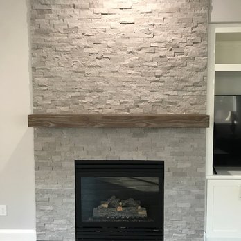 Jcustom Stone - Chiseled Marble Floor to Ceiling Fireplace - General Contractors Near Me