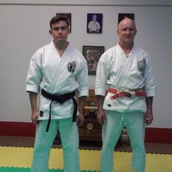 Academy Of Asian Martial Arts - Evan Varney and me after his black belt test.