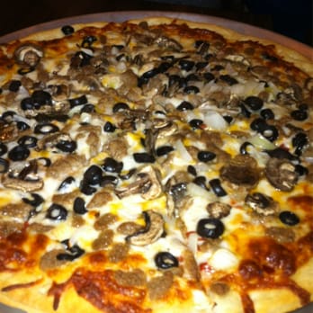 Pizza On Broadway - a pizza with mushrooms and olives - Pizza Near Me - Hooker, Oklahoma Pizza On Broadway - a pizza with mushrooms and olives - Pizza Near Me - Hooker, Oklahoma
