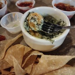 Artichoke spinach dip. Too long in microwave , that cheese top would have made a good Frisbee Artichoke spinach dip. Too long in microwave , that cheese top would have made a good Frisbee