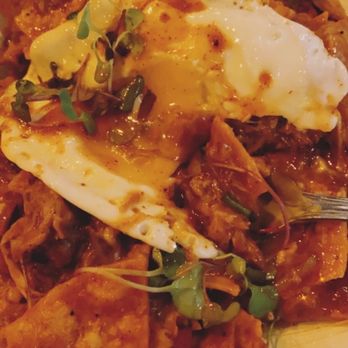 Bosscat Kitchen & Libations - Chilaquiles from the brunch menu minus the sour cream - New American Near Me - Houston, Texas Bosscat Kitchen & Libations - Chilaquiles from the brunch menu minus the sour cream - New American Near Me - Houston, Texas
