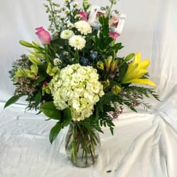 Joyce's Florist - Arrangement available year round!