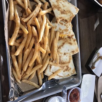 East Coast Wings + Grill - Sorry it's sideways, but that a cheeseburger quesadilla with fries. It also comes with salsa & sour cream. - Chicken Wings Near Me - Mt Airy, North Carolina