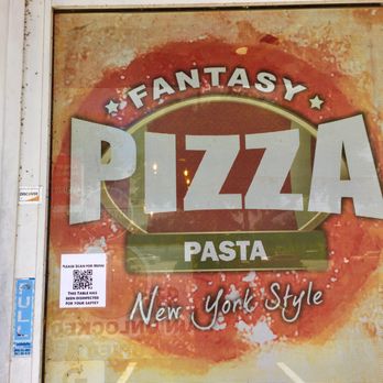 Fantasy Pizza - a sign in a window - Italian Near Me - Pembroke Pines, Florida