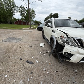 Gerber Collision & Glass - Damage to my Nissan Armada Platinum after a hit & run driver nearly totaled it! - Windshield Installation & Repair Near Me - Lake Charles, Louisiana
