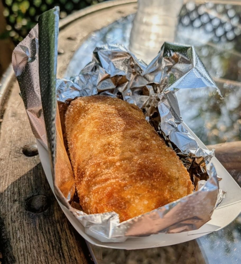 Rollie Pollie's Takeout and Catering Logo