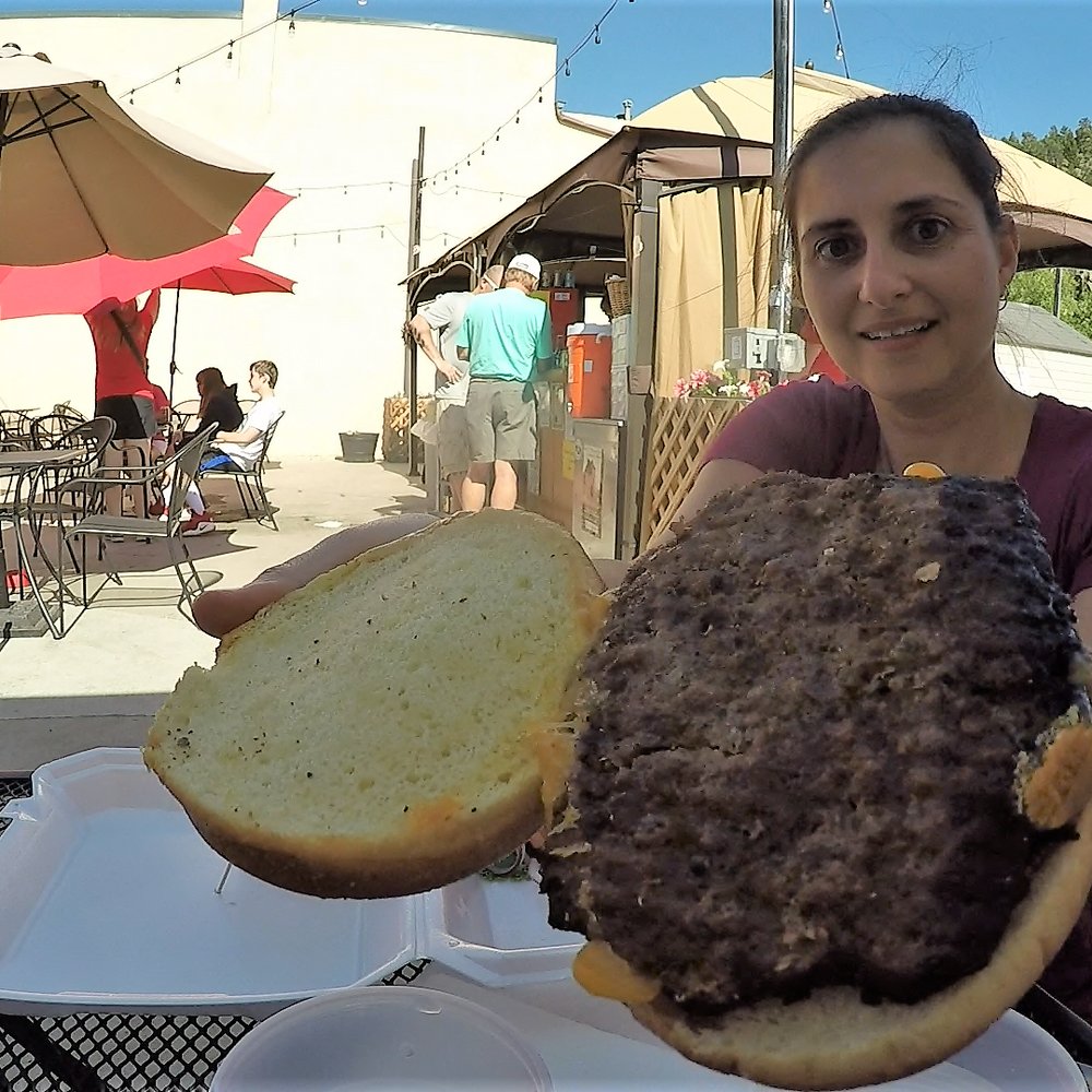 The Slab Outdoor Pub - Burger a little too well done for my taste. - Beer Gardens Near Me - Estes Park, Colorado The Slab Outdoor Pub - Burger a little too well done for my taste. - Beer Gardens Near Me - Estes Park, Colorado