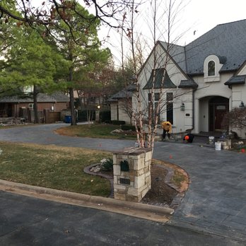 Summit Concrete And Construction - a driveway in a residential neighborhood - Masonry/Concrete Near Me